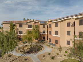 Las Vegas apartment for rent - A building with a courtyard in the middle of it.