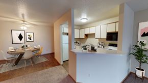 Sioux Falls apartment for rent - A kitchen area with a dining table and chairs.