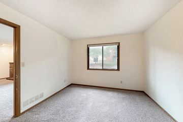 West Des Moines apartment for rent - a living room with carpet and a window