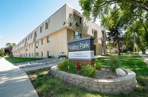 Grand Forks apartment for rent - A building with a sign that says Valley Park in front of it.