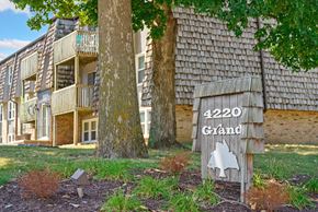 Des Moines apartment for rent - a sign that reads 4220 grand in front of a building