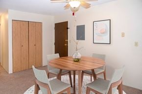 Grand Forks apartment for rent - A dining room with a round table and chairs.