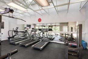 Kansas City apartment for rent - a gym with treadmills and other exercise equipment