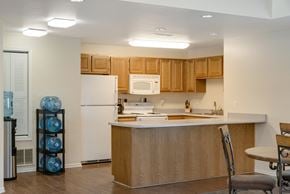Johnston apartment for rent - a kitchen with an island and a white refrigerator