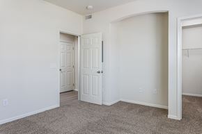 West Des Moines apartment for rent - an empty bedroom with a closet and an open door