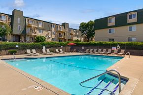 Urbandale apartment for rent - our apartments have a resort style pool with lounge chairs