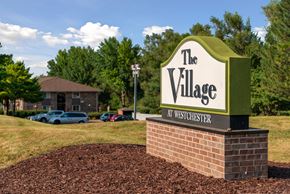 Des Moines apartment for rent - the village sign in front of thevillage apartments