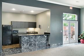 Bellevue apartment for rent - a kitchen with a counter and a door to a patio
