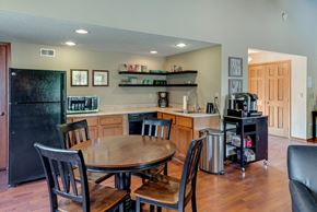 Des Moines apartment for rent - a kitchen and dining area with a table and chairs