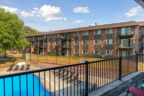 Des Moines apartment for rent - a balcony with a pool and an apartment building