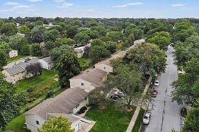 Omaha apartment for rent - an aerial view of a neighborhood with houses and trees