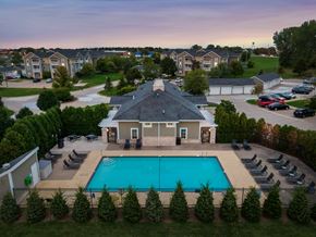 Davenport apartment for rent - an aerial view of a swimming pool in front of a house