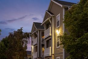 Davenport apartment for rent - a row of town houses at dusk with trees