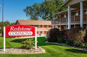 Davenport apartment for rent - a redstone commons sign in front of a building
