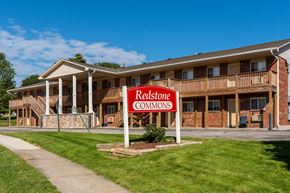 Davenport apartment for rent - a redstone commons sign in front of a building