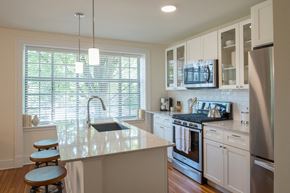 Washington apartment for rent - a kitchen with a sink and a counter top
