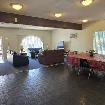 San Ysidro apartment for rent - A living room with a couch, chair, and table.