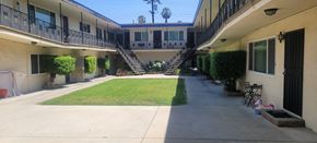 Arcadia multi-family for rent - A courtyard with a staircase in the middle.