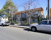 North Hollywood multi-family for rent - A white car is parked on the side of a street in front of a house with the number 5624 on it.