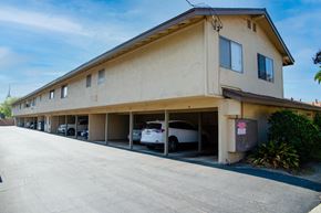 Covina multi-family for rent - A building with a parking garage underneath it