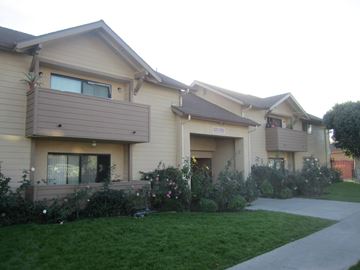 Sun Valley multi-family for rent - A residential building with a well-maintained lawn in front.