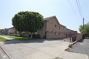 Sun Valley multi-family for rent - A large tree is in front of a building.