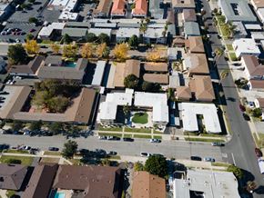 Covina multi-family for rent - A residential area with houses and trees.