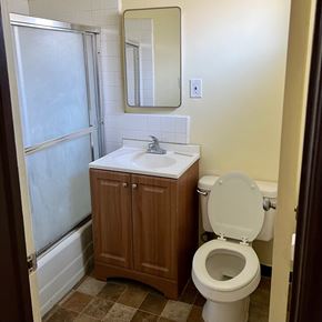 North Hollywood apartment for rent - A white toilet sits next to a sink in a bathroom.