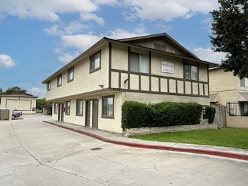 Fontana multi-family for rent - A building with a sign that says "PERMANENT WAITING ROOM" on it.