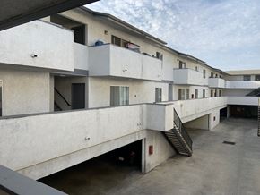 Inglewood multi-family for rent - A concrete building with multiple floors and staircases.
