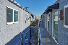 El Monte multi-family for rent - A row of houses with a blue sky in the background.