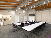 Hemet multi-family for rent - A conference room with a long table and chairs.