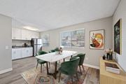 Moreno Valley apartment for rent - A dining room with a table and chairs.