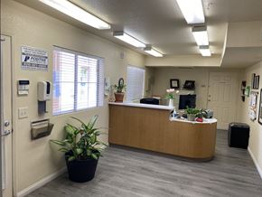 El Centro multi-family for rent - A reception area with a sign that says "POSITIVE" on the wall.