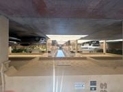 Gardena multi-family for rent - A parking garage with a concrete floor and a concrete ceiling.