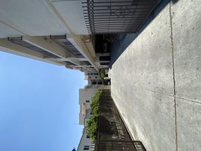Los Angeles multi-family for rent - A concrete wall with a metal rod sticking out of it.