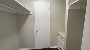 Temple City multi-family for rent - A white door is in a room with white walls.
