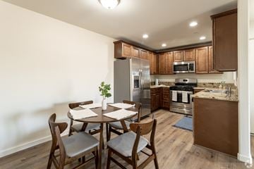 San Bernardino multi-family for rent - A kitchen with a table and chairs.
