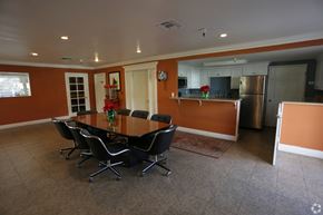 Ontario apartment for rent - A conference room with a table and chairs.
