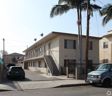 Los Angeles multi-family for rent - A street view of a residential area with a building numbered 132.