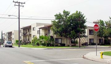Baldwin Park multi-family for rent - A stop sign is on a pole at a street corner.