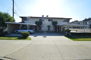 El Monte multi-family for rent - A house with a car parked in front.