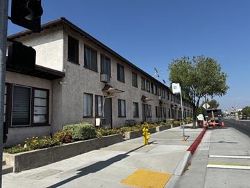 Azusa multi-family for rent - A street view of a building with a fire hydrant in front of it.