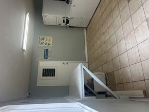 North Hills multi-family for rent - A room with a white wall and a white ceiling with a ventilation system.