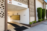 Bellflower multi-family for rent - A building with the number 8626 on the front.