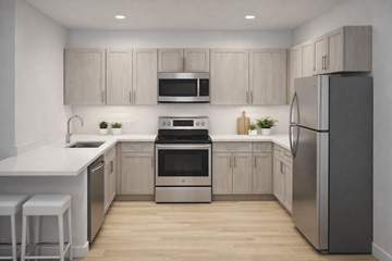 Trenton apartment for rent - A modern kitchen with stainless steel appliances and wooden cabinets.