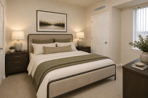 Lakeville apartment for rent - A bedroom with a large bed and a framed picture on the wall.