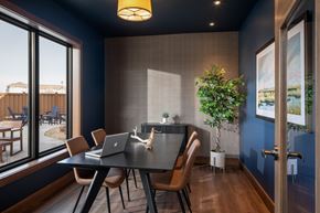 Prior Lake apartment for rent - A modern dining room with a table set for four.