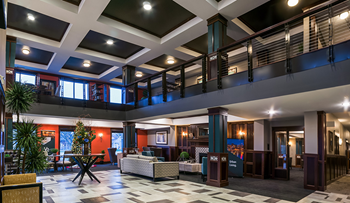 Apartment lobby entrance with seating and coffee bar