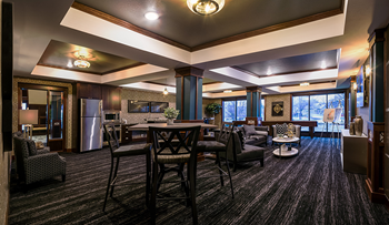 Clubroom at v2 apartments with shuffleboard